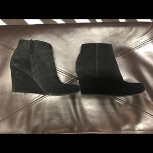 Black suede wedge booties.